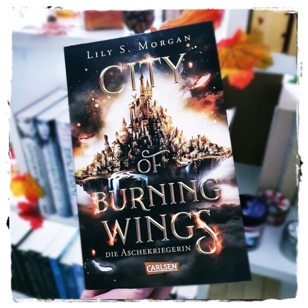 alt="City of Burning Wings. Die Aschekriegerin"
